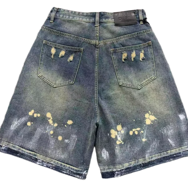 Blue denim shorts with paint-detail finish